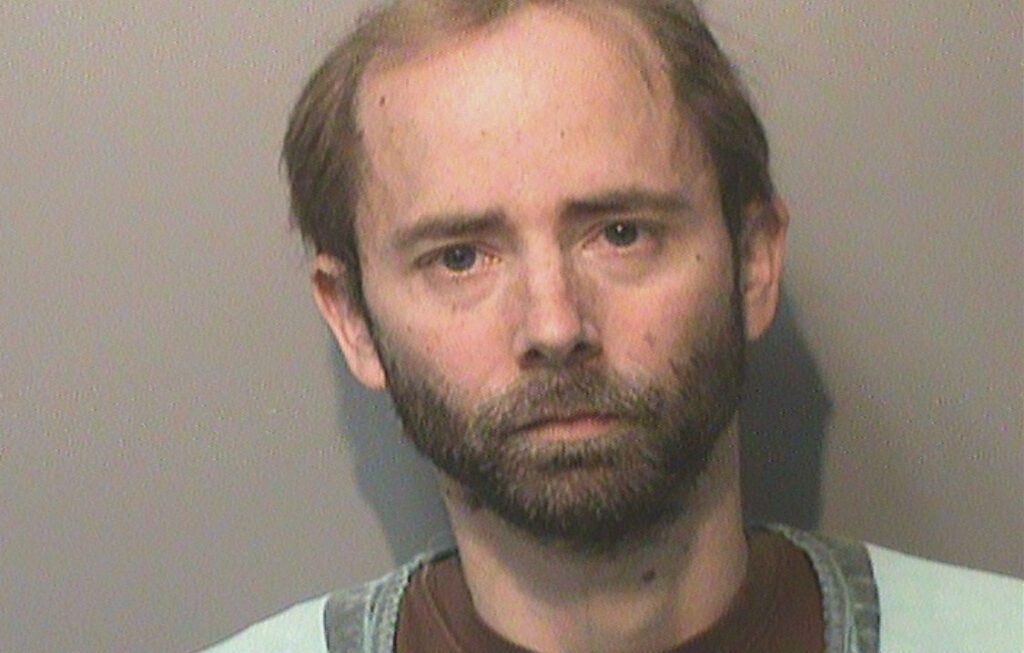 The cat was huddled in the bathroom, bleeding from multiple stab wounds, soaking wet, and terrified.