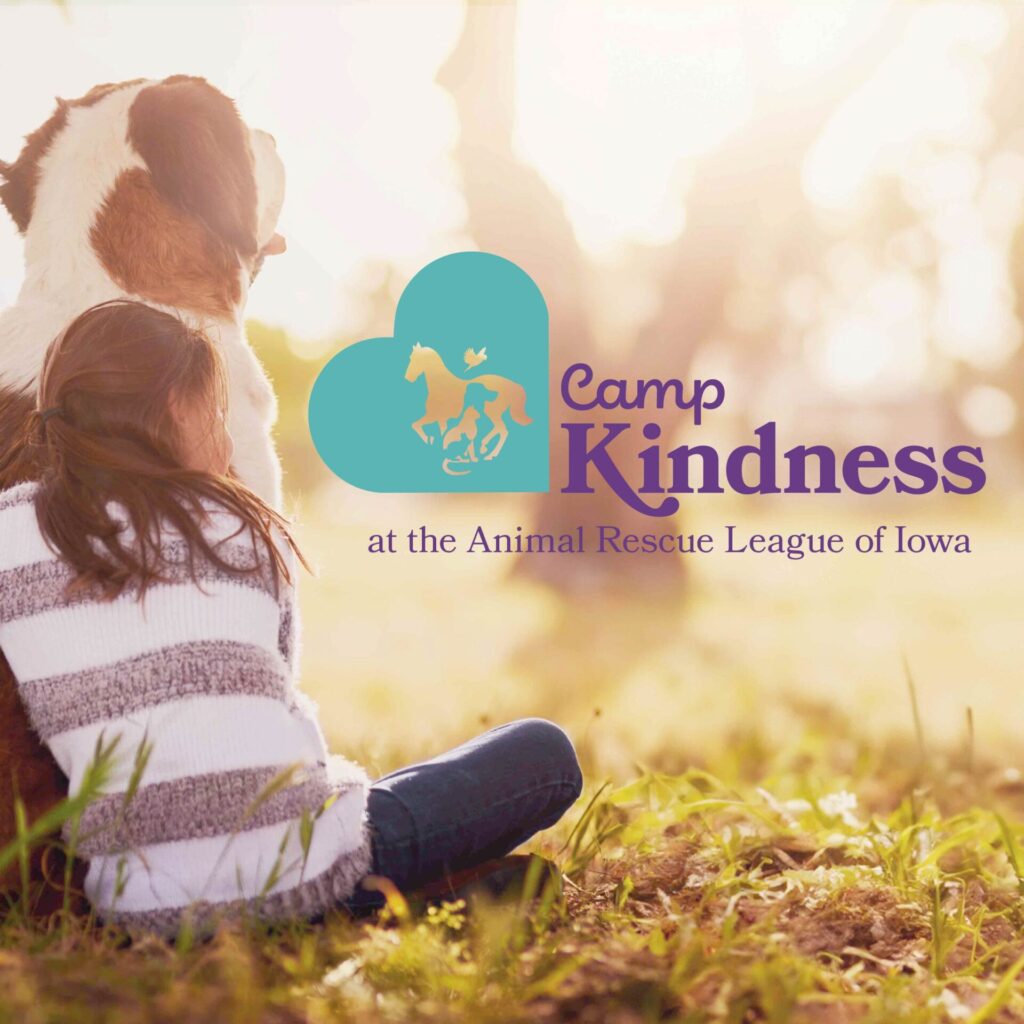 Camp Kindness at the ARL girl hugging dog