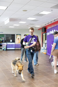 staff walking dog to potential adopter at ARL